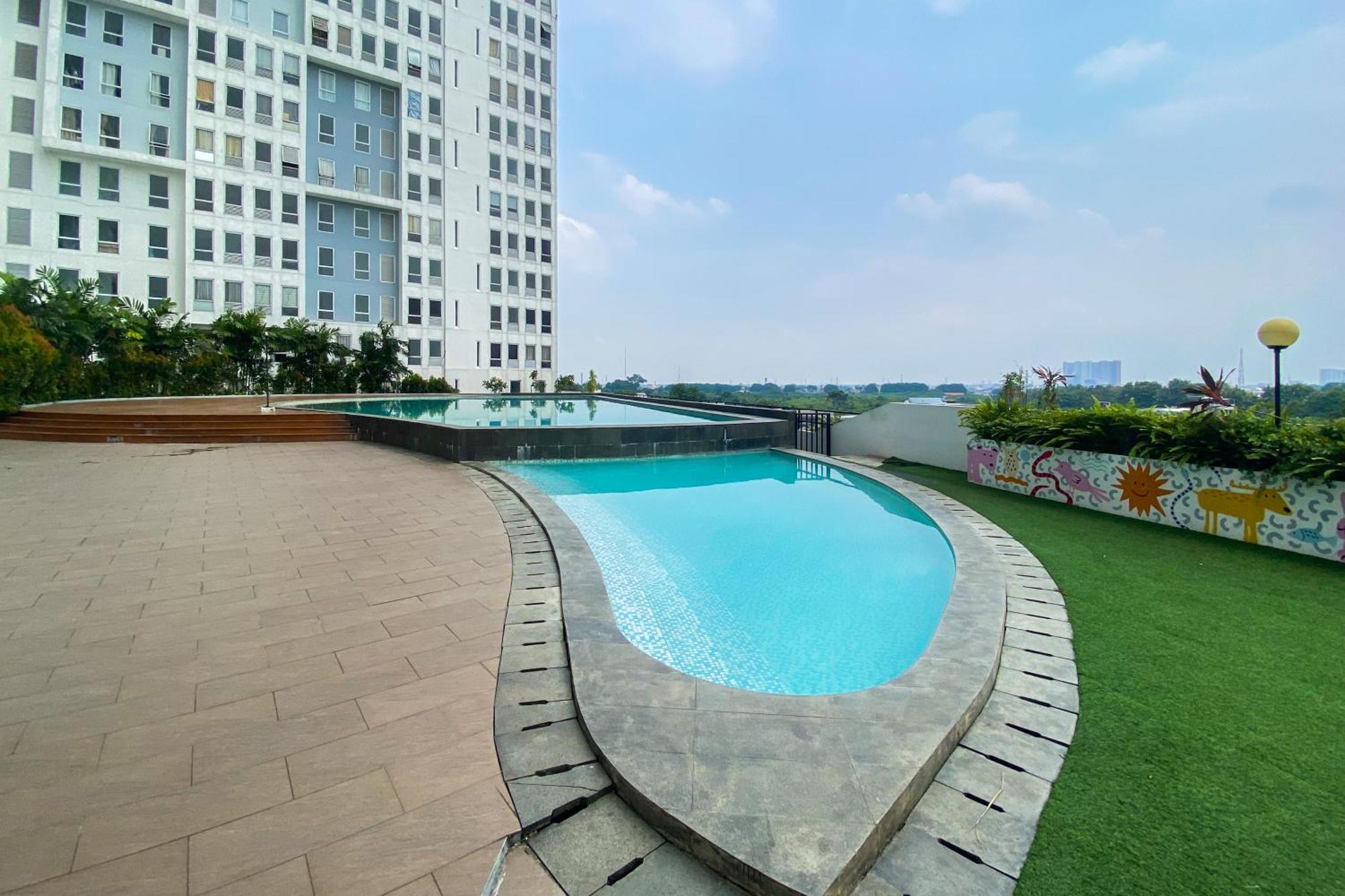Comfort 1br At Patraland Urbano By Travelio Apartemen
